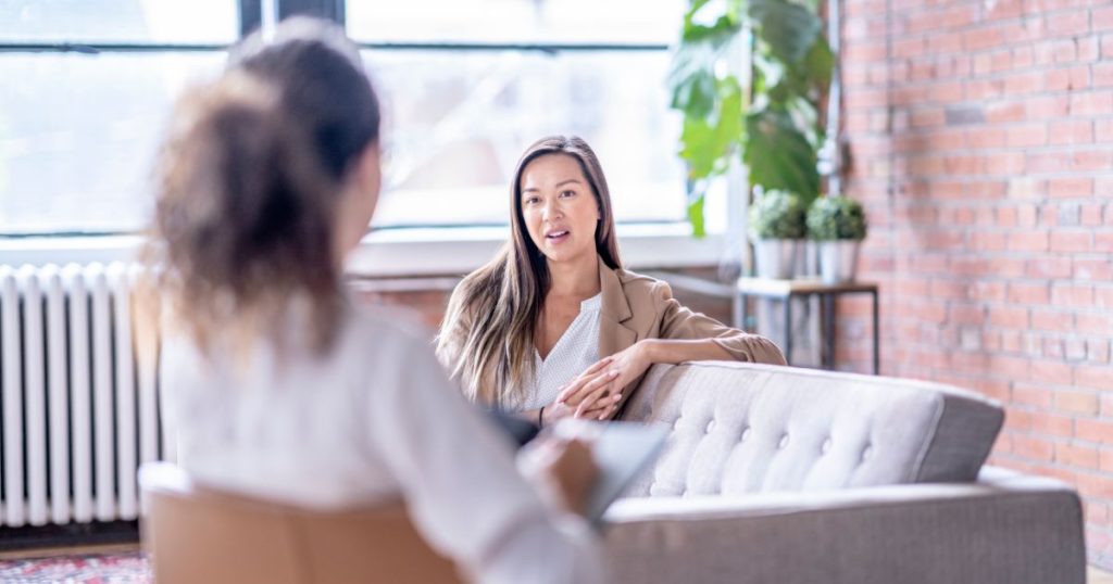 A woman getting a consultation for NAD+ therapy in Ballantyne in the Charlotte area.